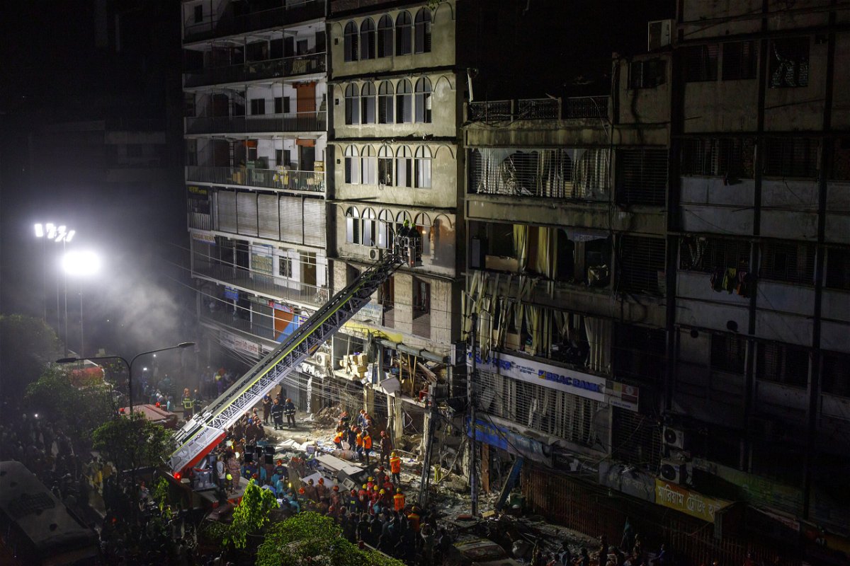 <i>K M Asad/LightRocket/Getty Images</i><br/>Firefighters and rescue workers are seen here at the site of an explosion in Dhaka