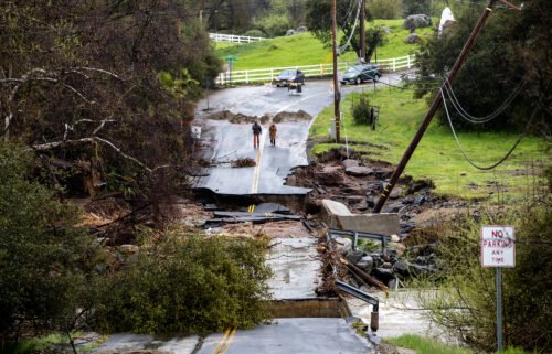 Hundreds of thousands in flood-ravaged California are without power and hundreds of people are in shelters as the latest atmospheric river sweeps though the state with ferocious hurricane-force winds and drenches already flooded neighborhoods.