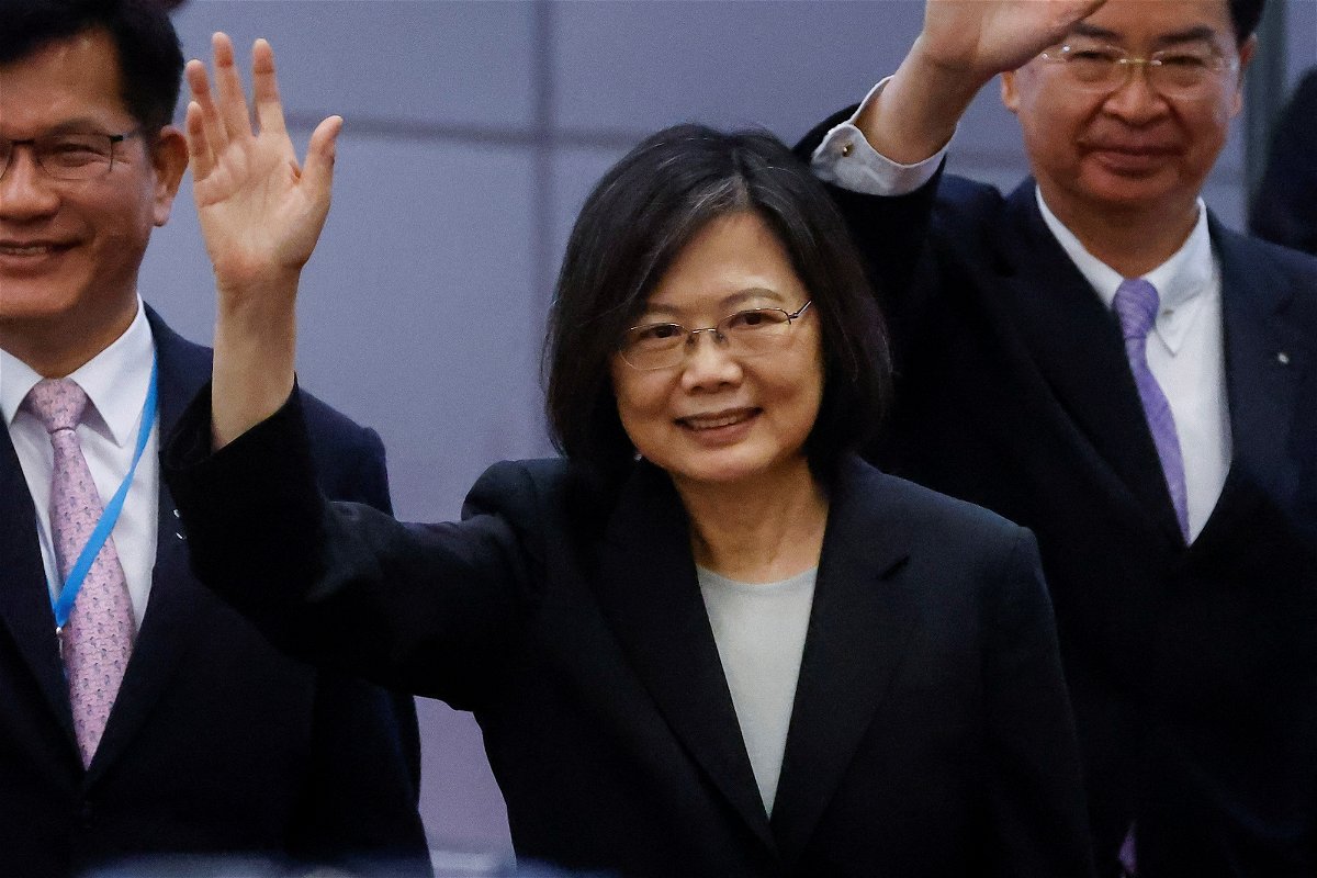 <i>Ann Wang/Reuters</i><br/>Taiwan's President Tsai Ing-wen waves near the boarding gate as she departs for a 10-day international trip on March 29.
