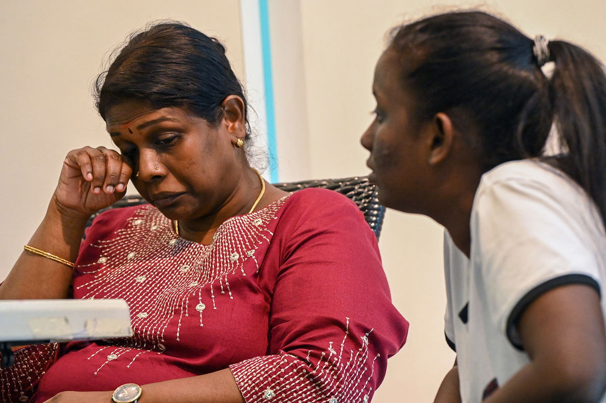 <i>Roslan Rahman/AFP/Getty Images</i><br/>Tangaraju's sister Leelavathy is seen here at a press conference in Singapore on April 23.