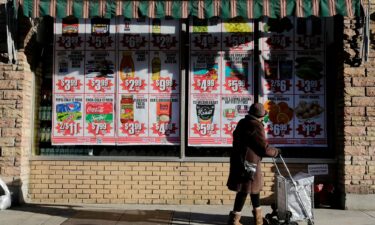 Prices are displayed in a grocery store on February 01