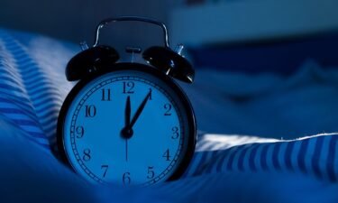 Checking your clock when you wake up early can trigger stress and make it hard to go back to sleep