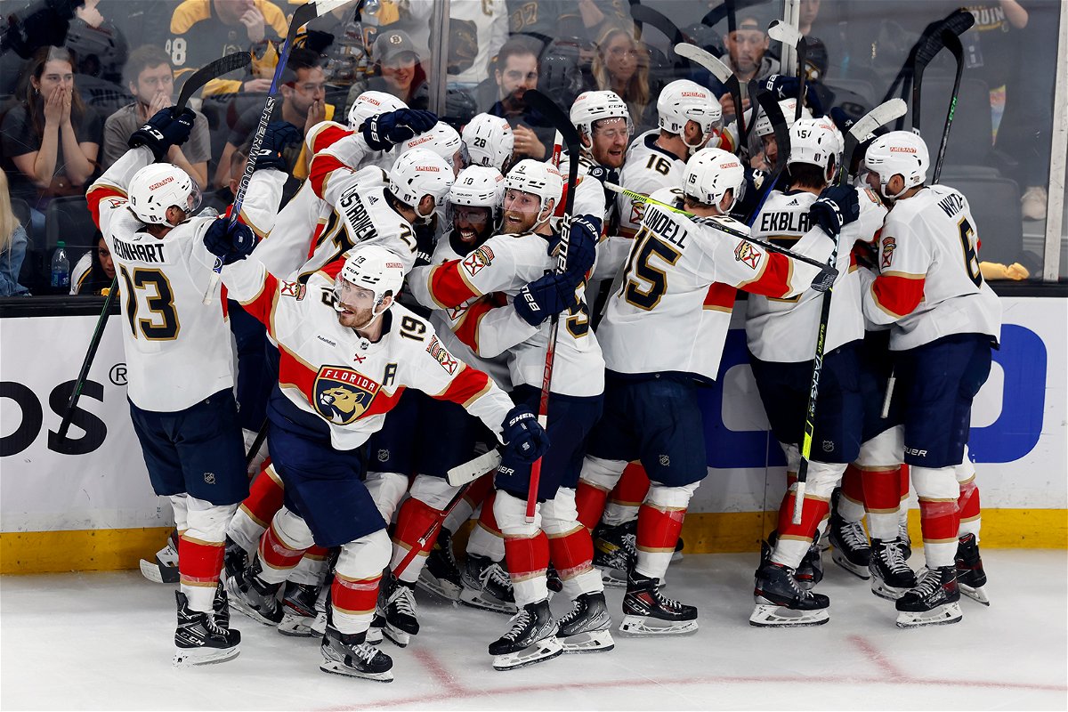 <i>Michael Dwyer/AP</i><br/>The Florida Panthers celebrate after defeating the Boston Bruins on a goal by Carter Verhaeghe in overtime during Game 7 of the NHL playoff series on Sunday