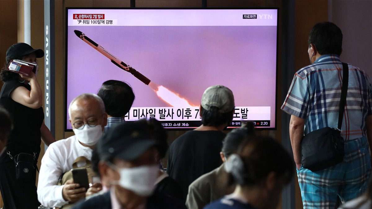 <i>Chung Sung-Jun/Getty Images</i><br/>People watch a television screen showing a file image of a North Korean missile launch at the Seoul Railway Station on August 17