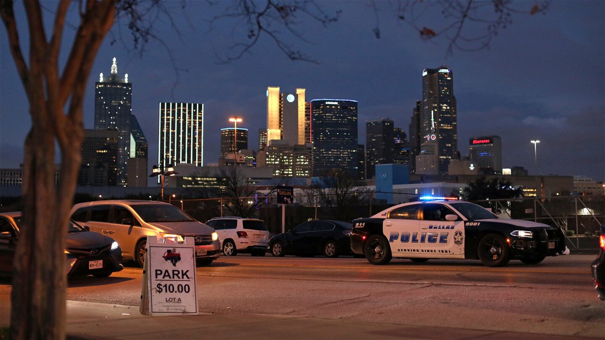 <i>Dylan Hollingsworth/Bloomberg/Getty Images</i><br/>A Dallas Police Department vehicle patrols an area in Dallas