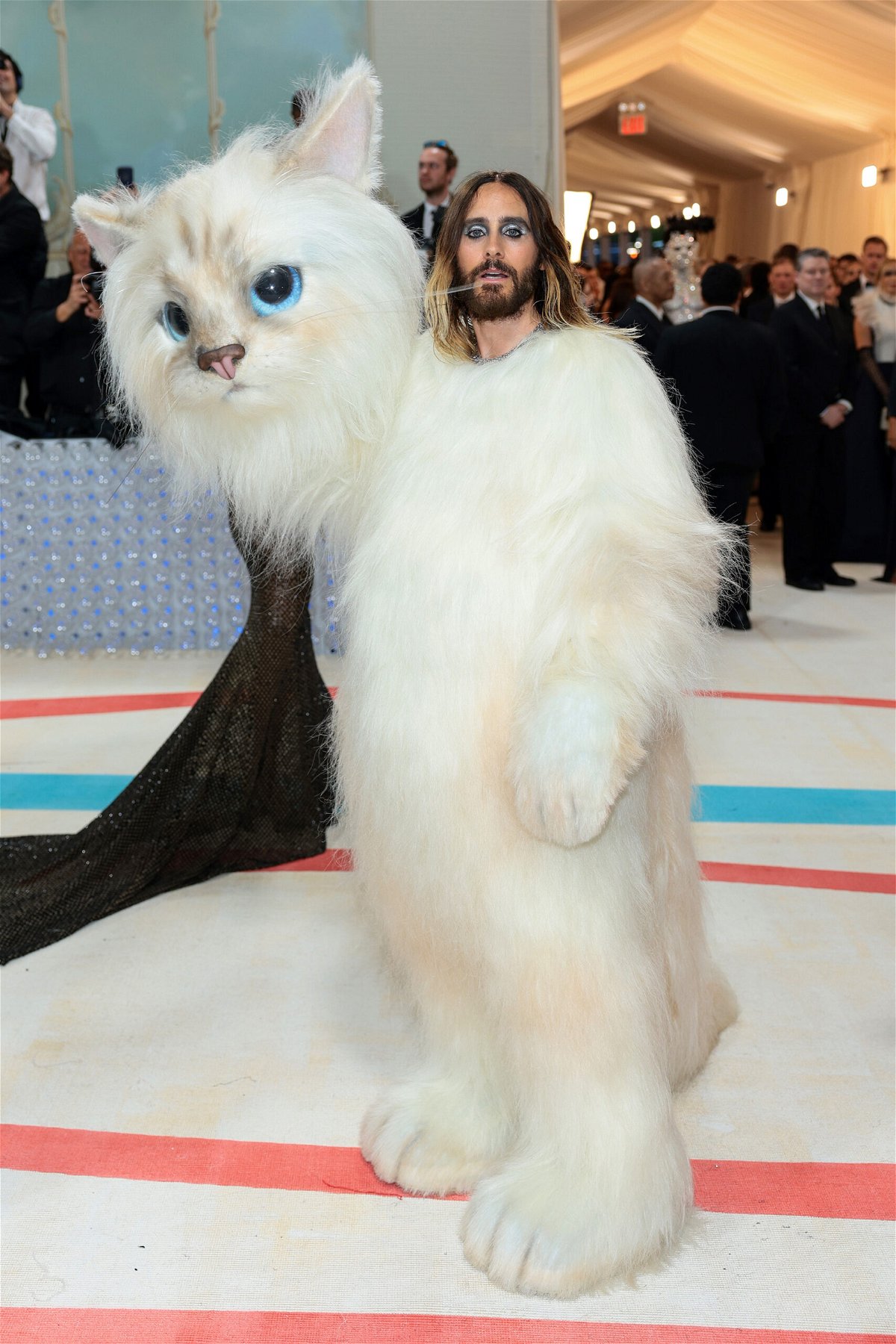 Doja Cat's Oscar de la Renta gown and feline facial prosthetics turned her into a couture cat.
