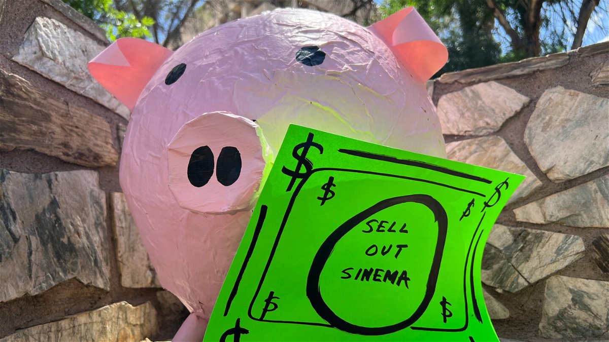 <i>Kyung Lah/CNN</i><br/>A pig prop with a sign that reads 