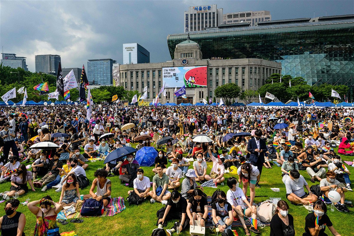 <i>Anthony Wallace/AFP/Getty Images/File</i><br/>South Korea's LGBTQ festival bumped from venue in favor of Christian youth concert. Participants of the Seoul Queer Culture Festival in South Korea gather at the Seoul City Hall Plaza in July