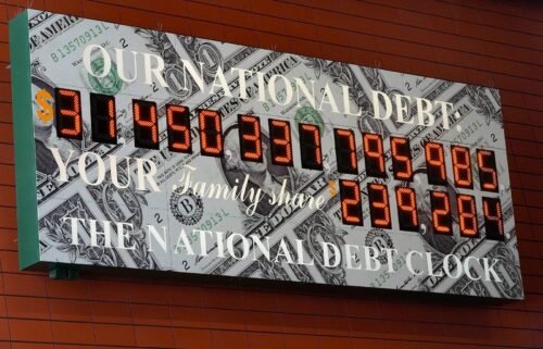 The debt ceiling package that President Joe Biden signed into law this past weekend doesn’t do much to fix the nation’s enormous financial challenges. The national debt clock is displayed here in midtown Manhattan