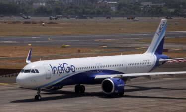 An IndiGo airlines passenger aircraft taxis on the tarmac at Chhatrapati Shivaji International airport in Mumbai