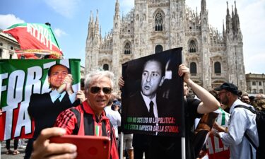 People assembled in Milan ahead of the service on Wednesday