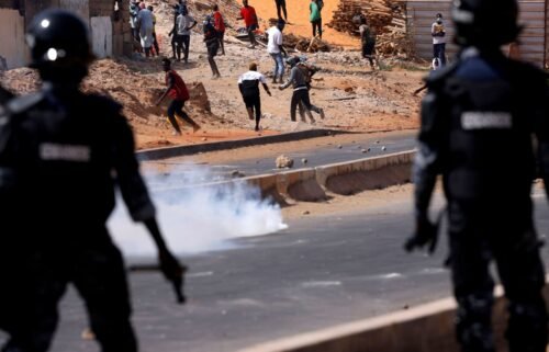 Supporters of Senegal opposition leader Ousmane Sonko clash with security forces after Sonko was sentenced to prison in Dakar