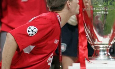 Steven Gerrard kisses the Champions League trophy.