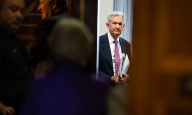 Federal Reserve Chairman Jerome Powell prepares to testify during the Senate Banking
