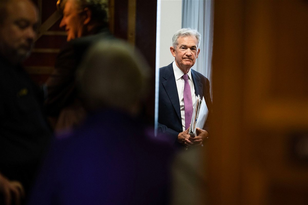 Federal Reserve Chairman Jerome Powell prepares to testify during the Senate Banking