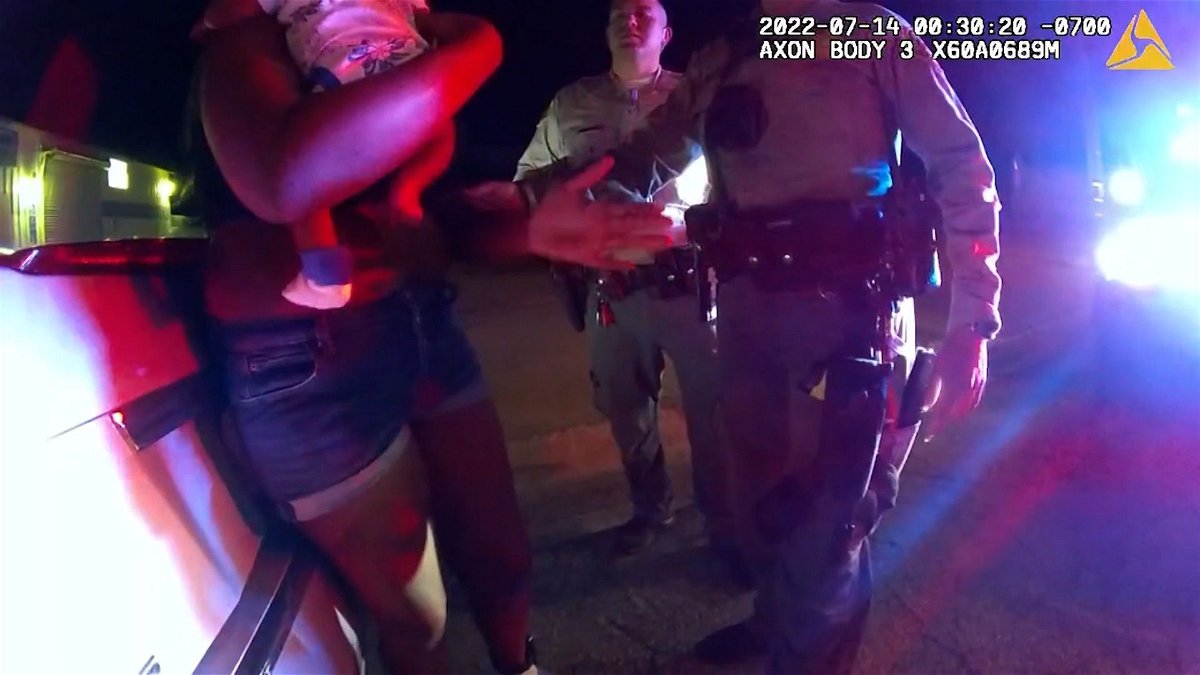 Body-cam video from July 2022 shows a woman being punched by a deputy as she held her newborn.