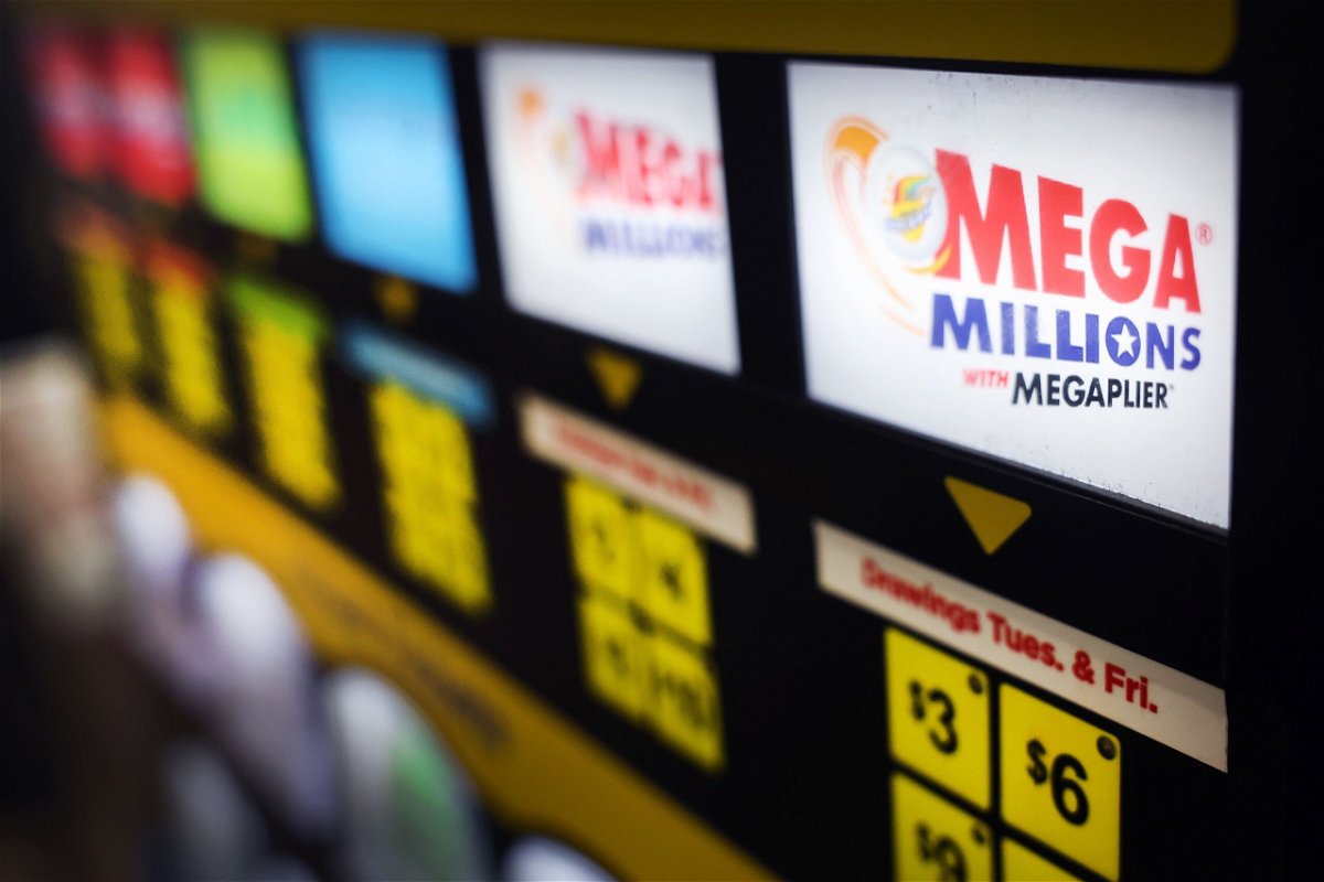 A lottery ticket vending machine offers Mega Millions tickets for sale on January 9