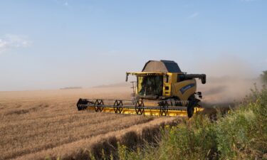 Harvester works on a wheat fields near ongoing Ukrainian counter-offensive in Prymorske