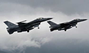 Two US-made F-16 fighters are pictured in the air during a scramble take off at the eastern Hualien air force base on January 23