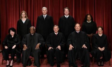 Justices of the US Supreme Court pose for their official photo at the Supreme Court in Washington