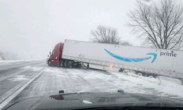 Nebraska first responders work along a slick I-80 on Monday between Grand Island and Lincoln.