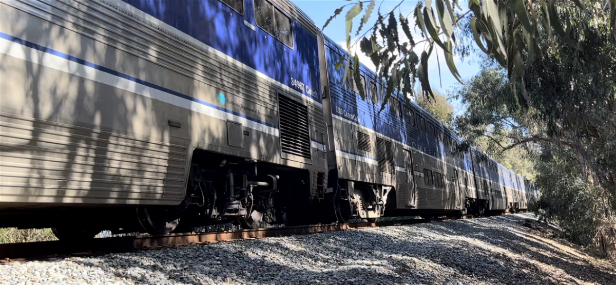 A northbound Amtrak train was stopped before noon after an incident that left a pedestrian injured.