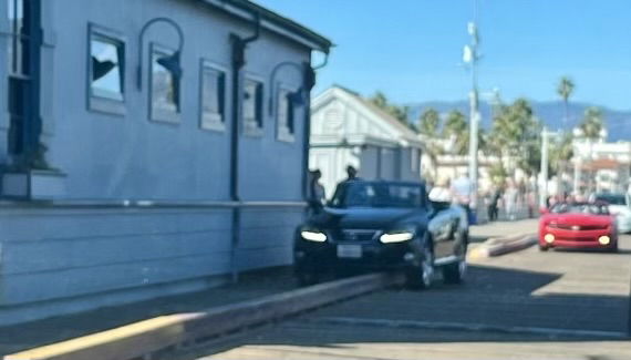 Good Samaritans help lift car stuck on wharf