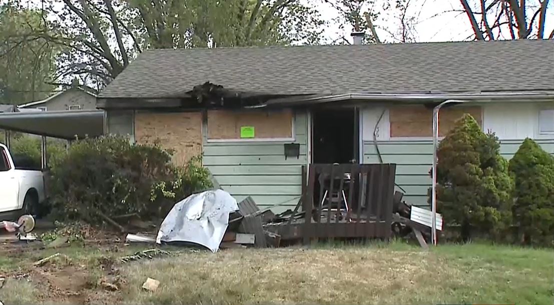 School bus catches fire, rolls backward through a neighborhood and into ...