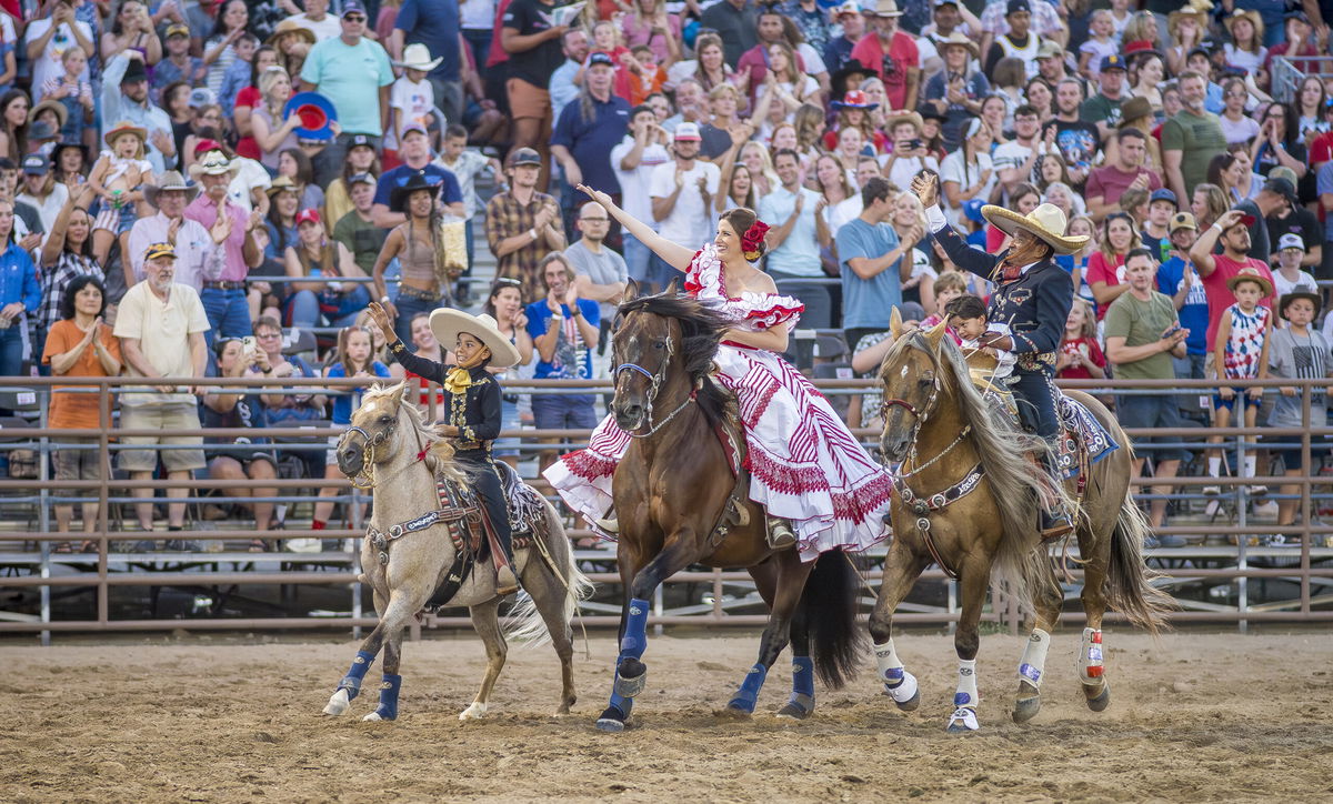 Familia Garcilazo performing their charro craft to an audience. 