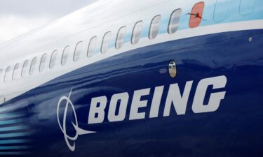 The Boeing logo is seen on the side of a Boeing 737 MAX at the Farnborough International Airshow in this 2022 file photo.