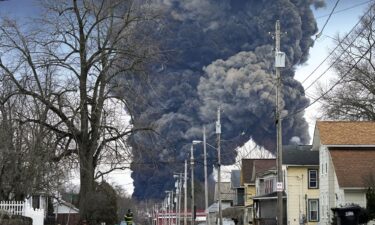 A black plume rises over East Palestine