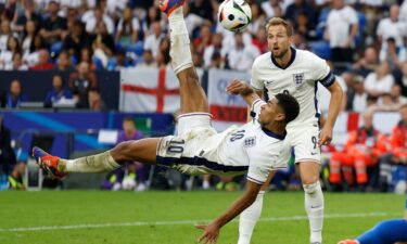 England's Jude Bellingham scores his team's first goal against Slovakia.