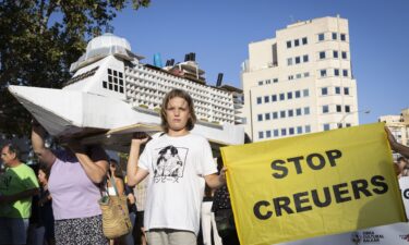 Protesters hold a banner which reads as "Let's change course" during a demonstration against mass tourism and housing prices held in Palma de Mallorca on the Spanish island of Mallorca.