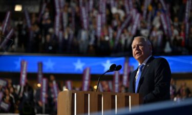 Democratic vice presidential nominee Minnesota Gov. Tim Walz speaks at the United Center during the Democratic National Convention in Chicago