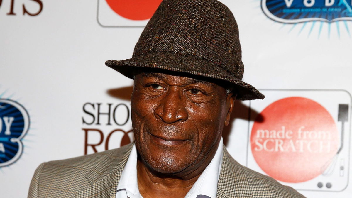 John Amos’ daughter says she learned of his death through the media