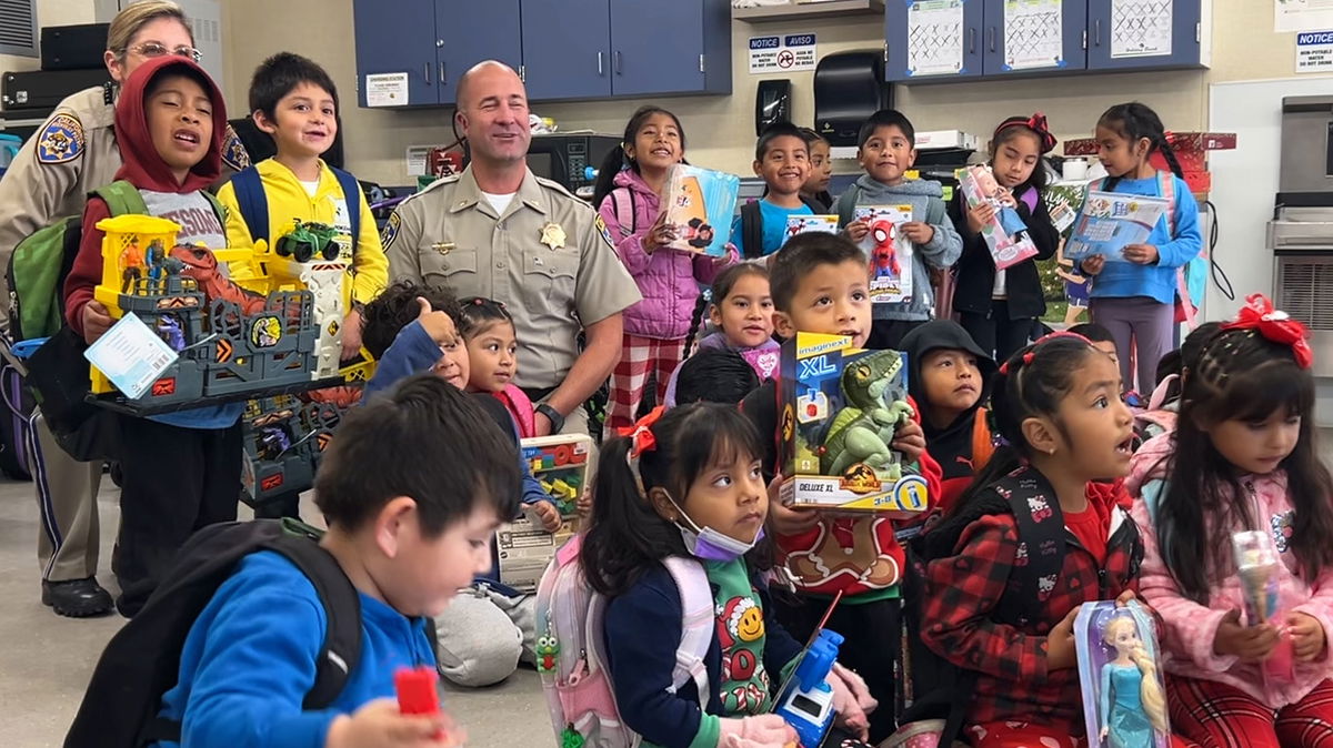 Santa Maria CHP gives Christmas presents to Bonita Elementary Students