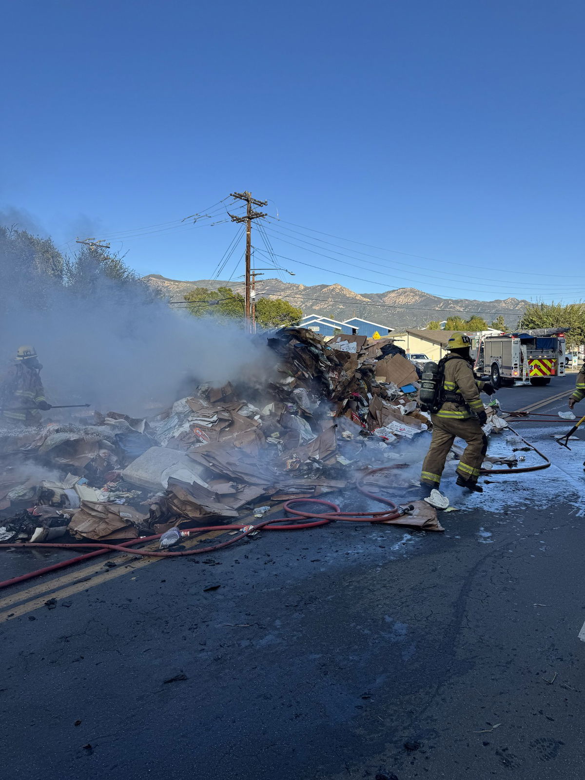 Garbage truck cargo catches fire on Calle Real