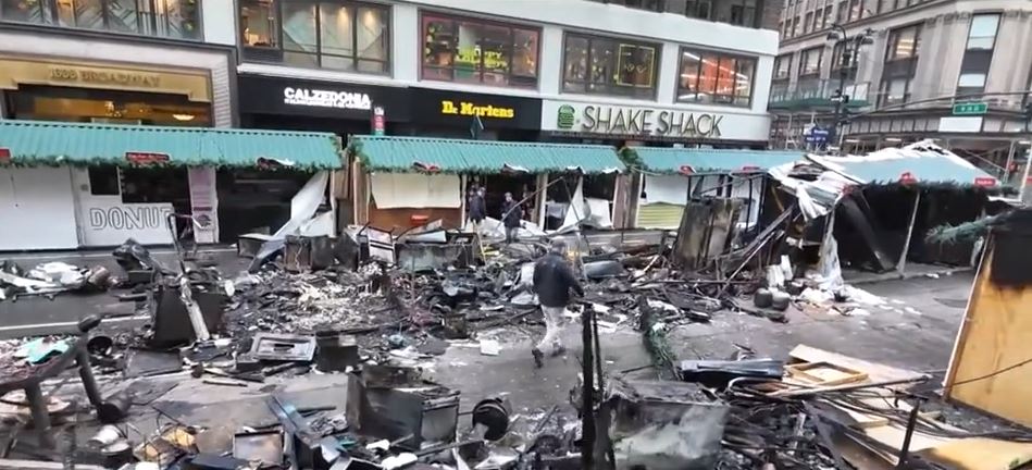 <i>WCBS via CNN Newsource</i><br/>A fire spread through vendors' booths at the Herald Square Holiday Market