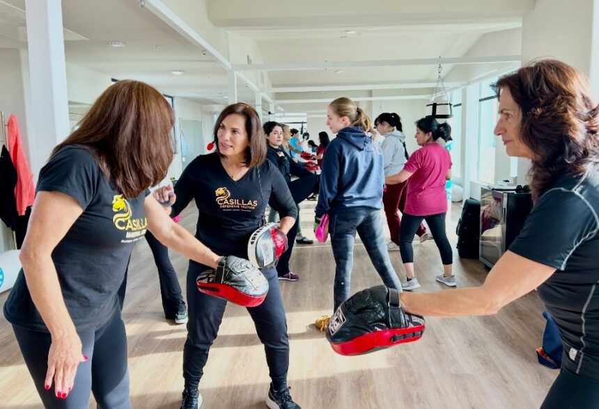 Women learn self defense from world champ in Ventura