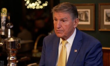 Sen. Joe Manchin is interviewed by Manu Raju at the Dubliner in Washington