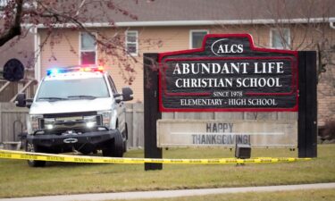 Emergency vehicles are parked outside the Abundant Life Christian School in Madison