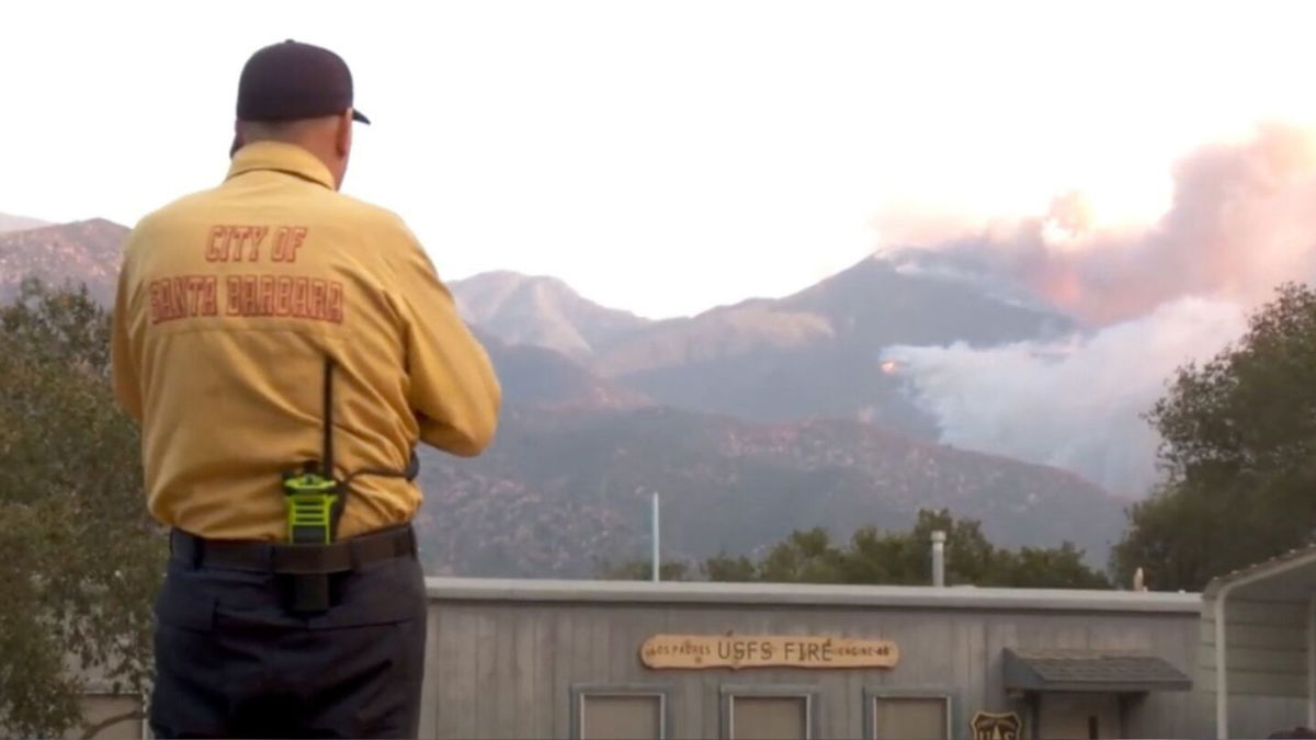 Firefighter looks on as the 2017 Thomas Fire approached.