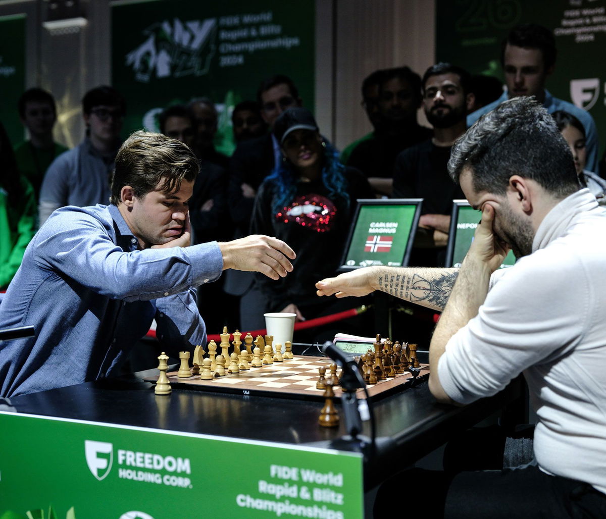 Magnus Carlsen and Ian Nepomniachtchi agree to share chess’ World Blitz Championship title, causing outcry from top players