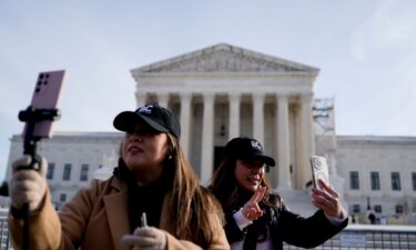 Content creators livestream outside the US Supreme Court in Washington