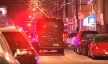 Philadelphia's SWAT team responded to a shooting in the city's Frankford section a man shot a woman four times while arguing over loud music.