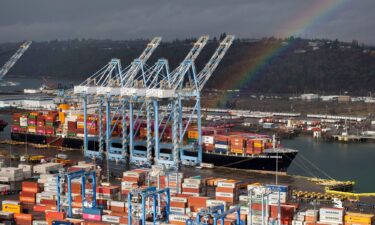 A rainbow forms over the Port of Tacoma in Tacoma