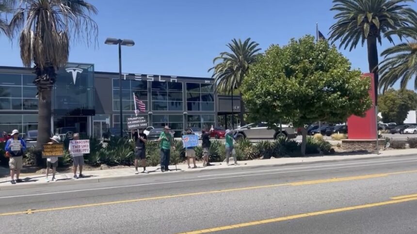 Protests outside Tesla dealerships continue