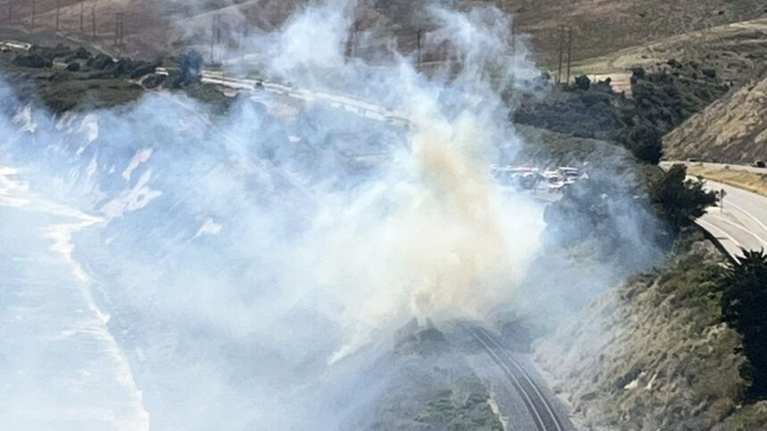 Fire crews help with vegetation fire near Gaviota coast Tuesday afternoon