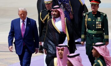 US President Donald Trump is greeted by Saudi Crown Prince Mohammed bin Salman as he arrives at King Khalid International Airport on May 13