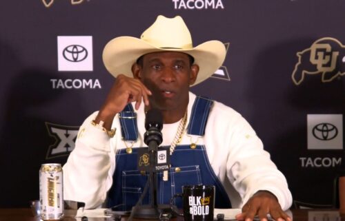 Colorado head coach Deion Sanders talks to reporters on July 28. Sanders said he has fought – and beaten – cancer after having his bladder removed